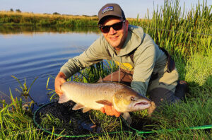Laks i Skjern aa paa flue og spin med fiske eventyr og zpey og jesper nymann og bruno stamm 6 % - fishingweeks